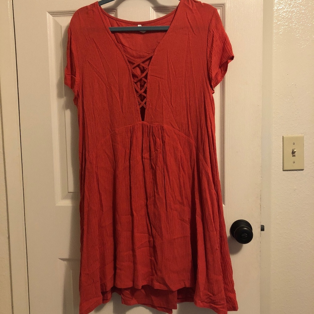 Cute orange flowy low cut dress